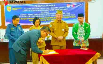Penandatanganan NPHD Antara Pemerintah Kabupaten Gunung Mas dengan KPU dan Bawaslu Kabupaten Gunung Mas